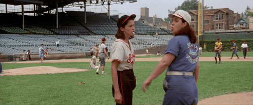 Women throwing a baseball around like a boss